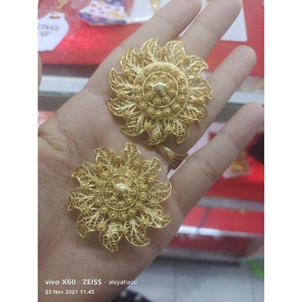 Bros dan cincin lapis emas matahari