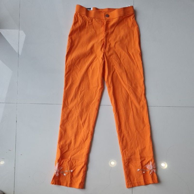 Celana panjang wanita merk SUGGEST warna orange manik size M preloved