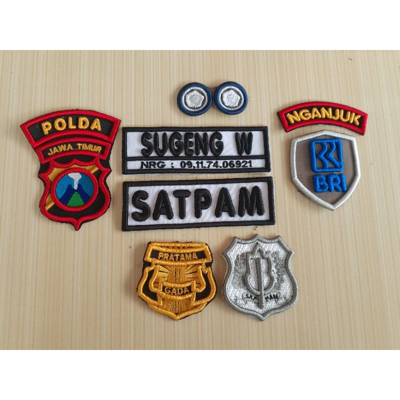BORDIR TIMBUL ATRIBUT SATPAM BRI