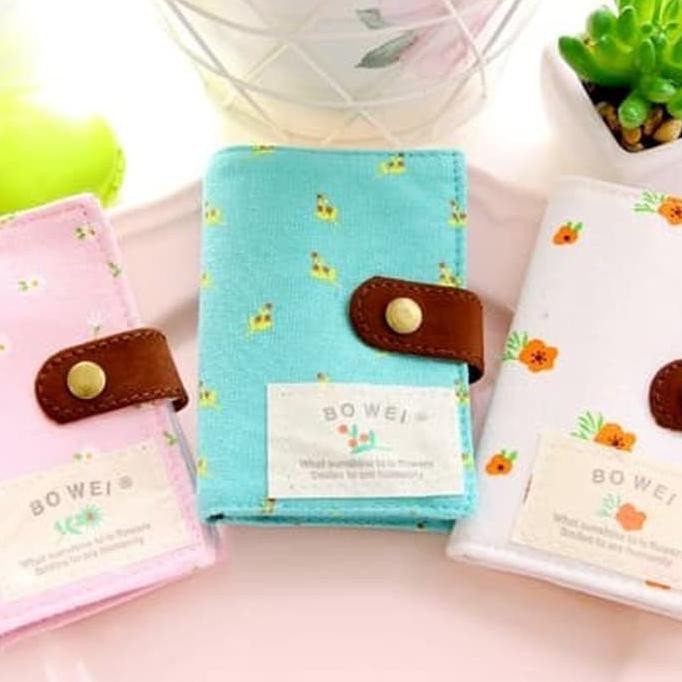 

CARD HOLDER CANVAS ISI 11 POCKET BISA BOLAK BALIK - PUTIH TERLARIS