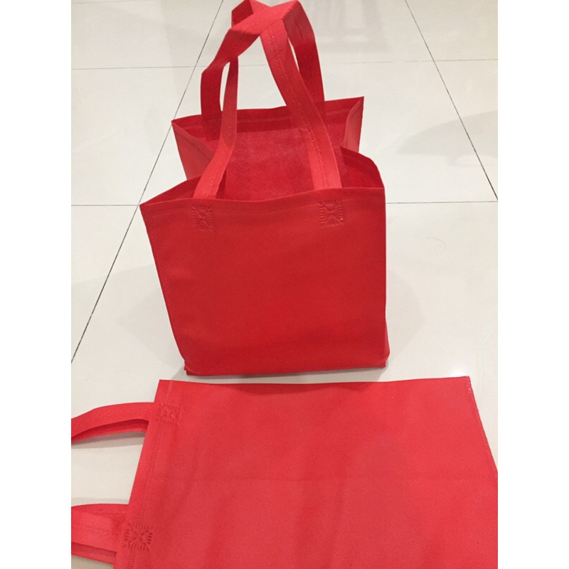 

tas kain goodie bag merah goodie bag dus kue kotak 22/25 cm goodie bag souvenir imlek sponge bag merah