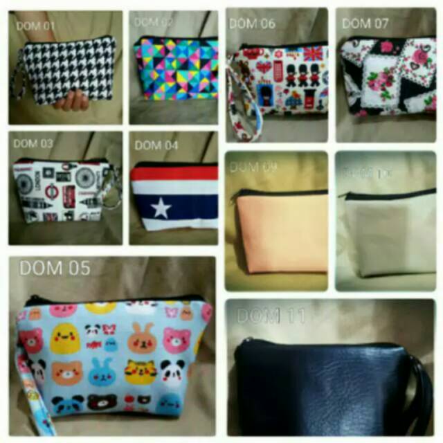 DOM ( Dompet HP/ Kosmetik/ Uang)  ini dompet kecil sis ya, dilihat size nya dulu..