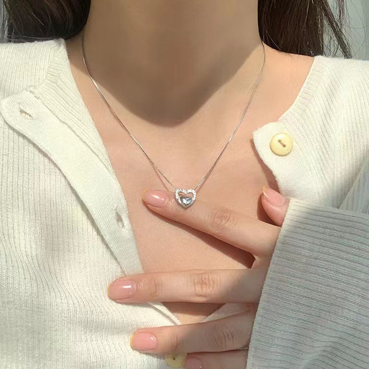 Kalung Liontin Hati Hollow Bahan Alloy Aksen Berlian Imitasi Gaya Korea Untuk Wanita