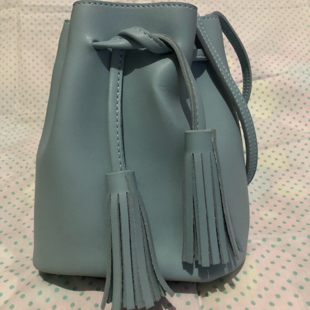 Preloved bucket bag blue miniso