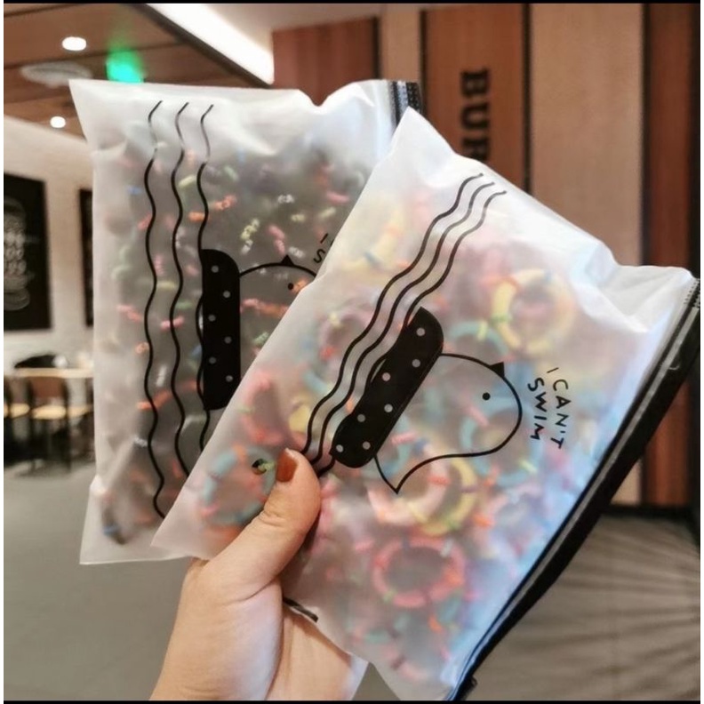 [isi 50 pcs] Ikat Rambut Donat Terlaris Free Pouch Korean Style Import