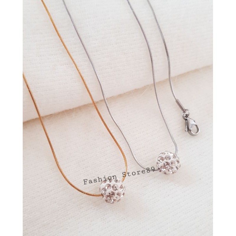 Kalung Fashion Bola permata Putih Titanium Antikarat