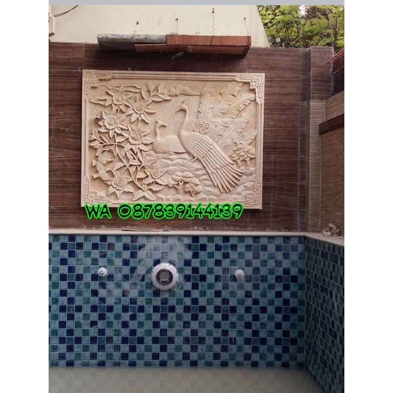 hiasan dinding ukir batu