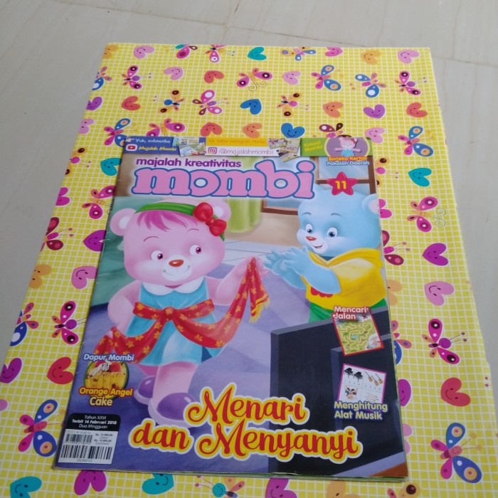 Majalah Mombi menari dan menyanyi