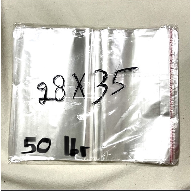 

Plastik OPP Perekat u/ Pakaian Buku dkk 28x35 isi 50lembar