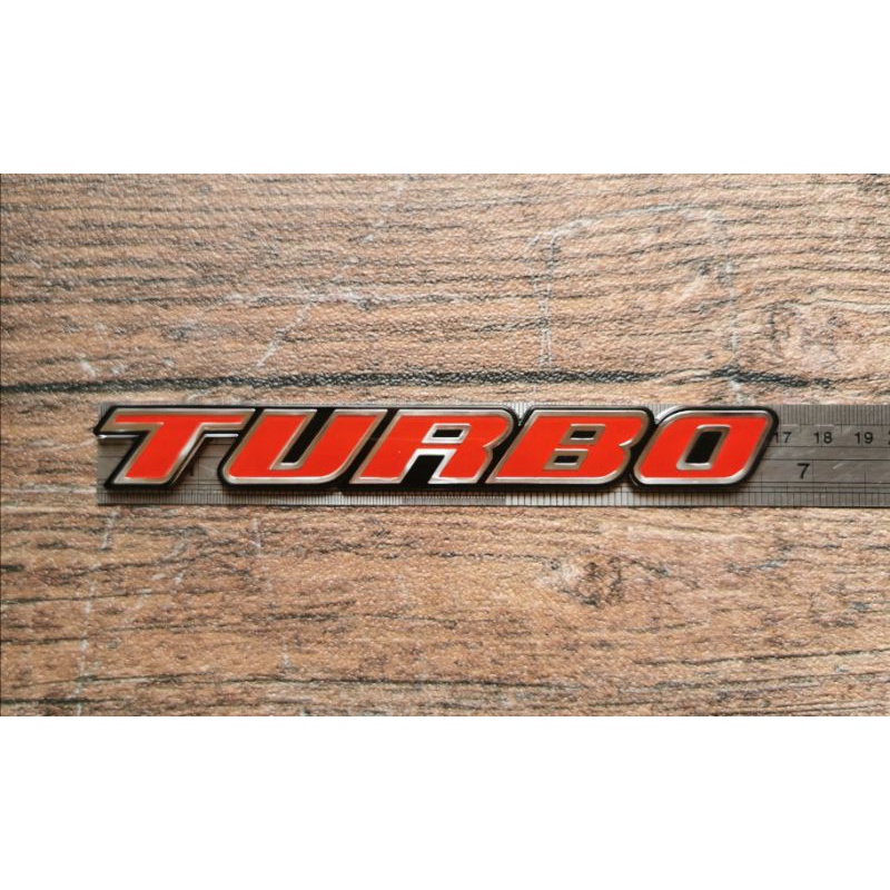 emblem tulisan Turbo merah