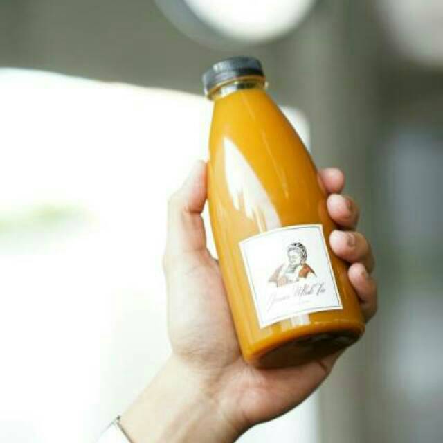 

Jamu Kunyit asam / kunyit asem / minuman herbal 100% tanpa bahan pengawet