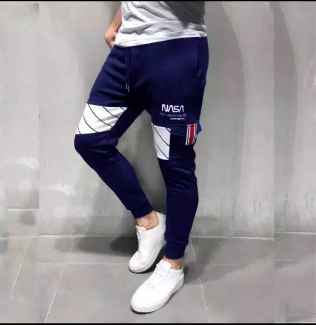 TOTOTAshop.Celana Jogger NASA JUMBO 34-38 FIT XL-XXL,Bahan Fleece tebal.Motif sablon.