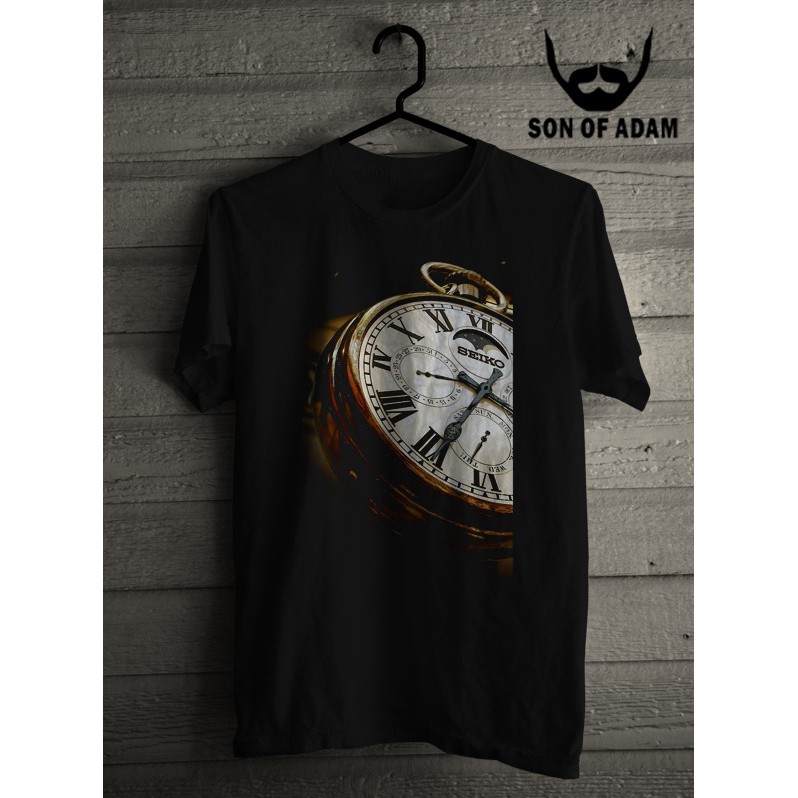 KAOS PRIA SABLON DTG JAM ANGKA ROMAWI