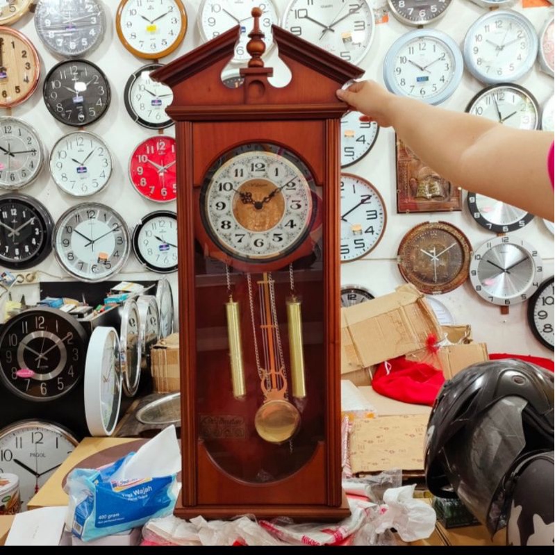 jam dinding Welington kayu jati bandul goyang bunyi