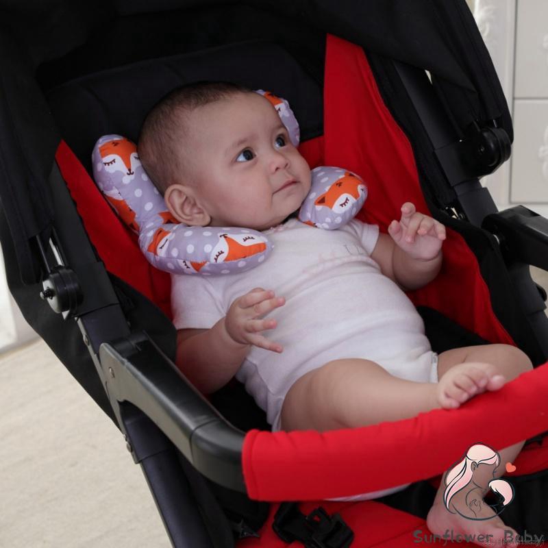 baby sleeping in car seat stroller