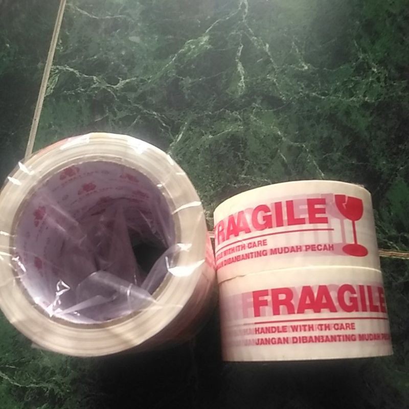 

Lakban fragile printing tebal 100 yard