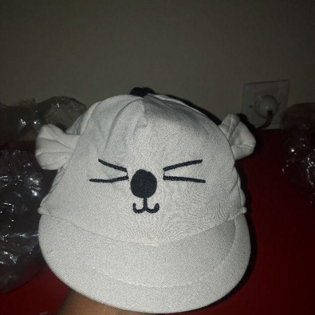 (1kg isi 25 pcs)Topi Bayi korea Karakter Kucing / COD-krem