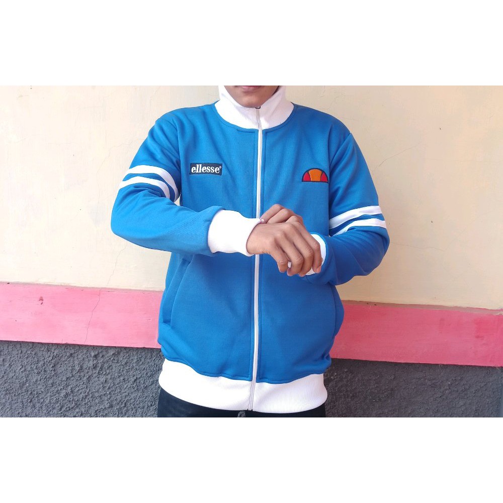 TERLARIS jaket cassual Ellesse Rimini Navy strip putih - tractop Ellese Jaket Keren