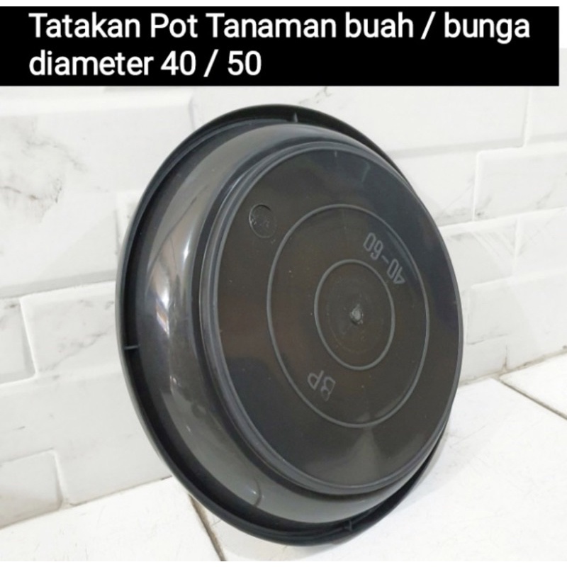 tatakan pot ukuran 50