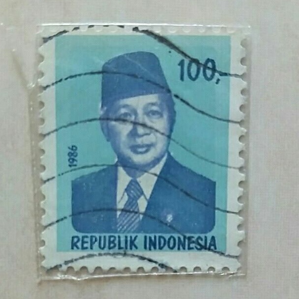 

(AD) Perangko Indonesia 1986 Presiden Soeharto Nominal 100 Rupiah Used