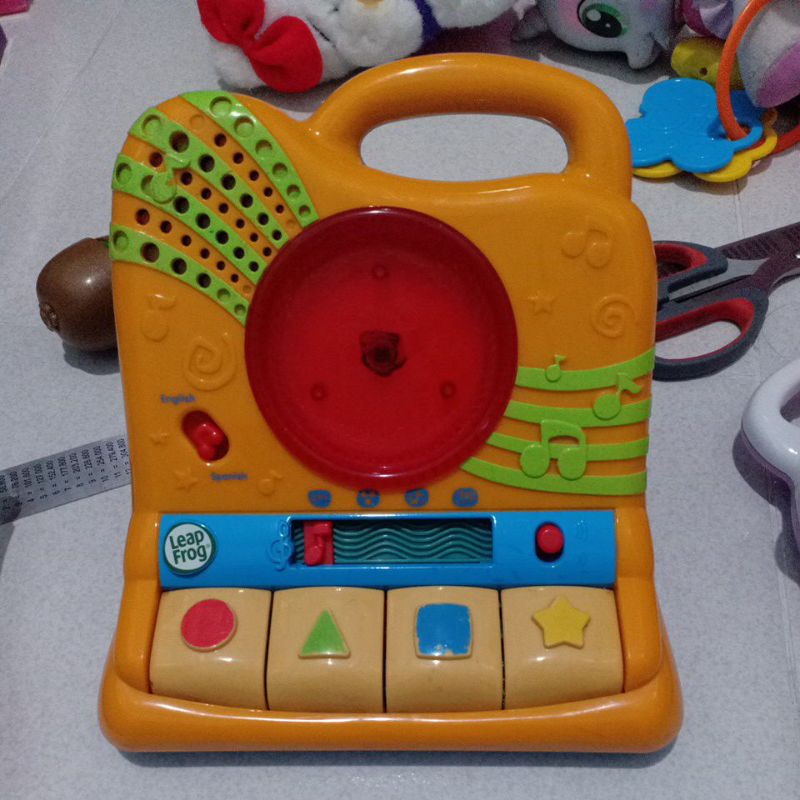 Preloved leap frog piano shape