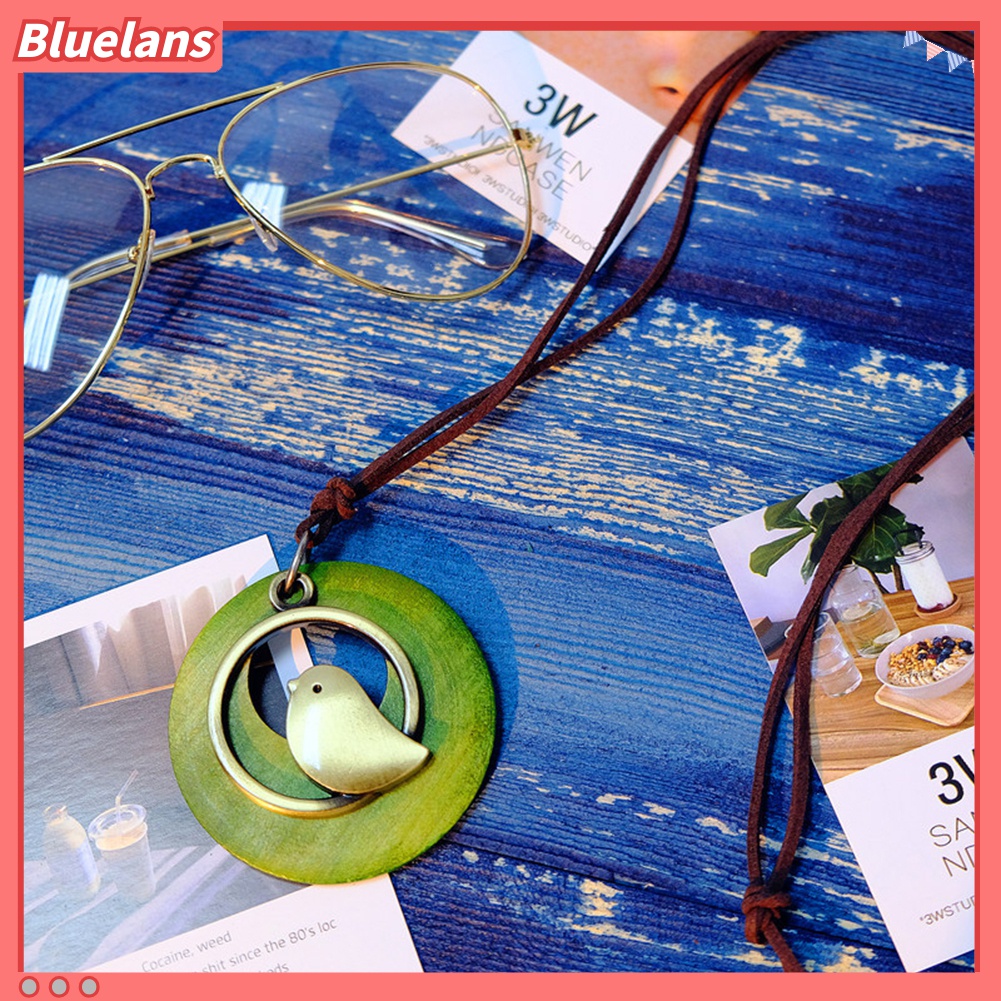 Kalung Liontin Bentuk Lingkaran Hollow Burung Bahan Kayu Gaya Etnik Untuk Wanita