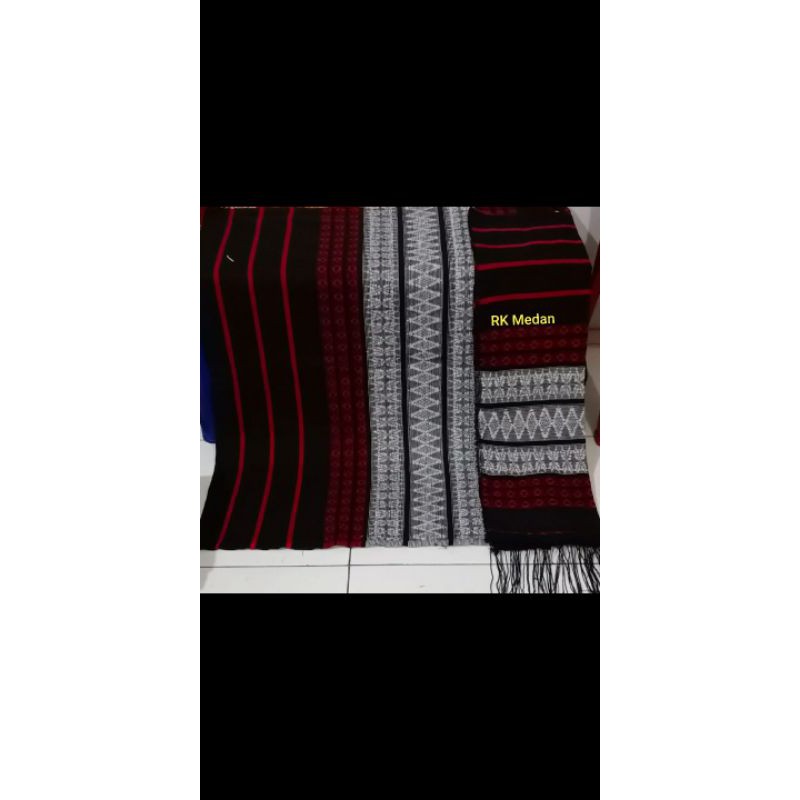 Rp.250.000Pucca Siantar, sarung lilit dan selendang,benang timbul ,bukan katun