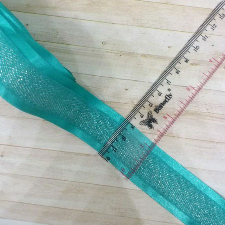 

RP30.000/15YARD.TWILLTAPE TOSKA DEGRADASI SILVER SISI SATIN LEBAR 3CM