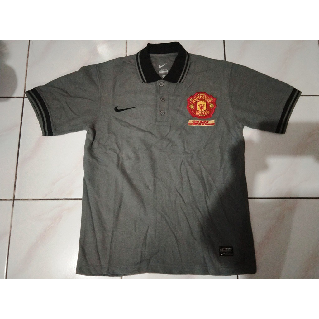 Polo Shirt Manchester United/MU DHL abu hitam KW Thailand Grade Ori