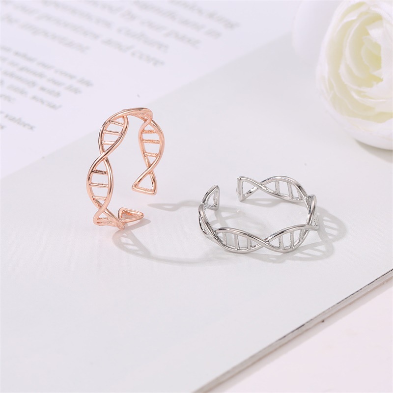 Cincin Model Terbuka Bentuk Tulang Ikan Motif Garis Silang Warna Rose Gold Untuk Wanita