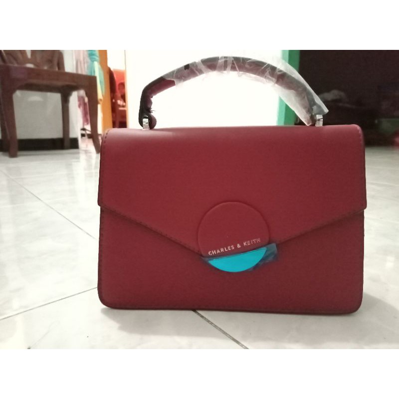 

Tas amplop Ck merah marron