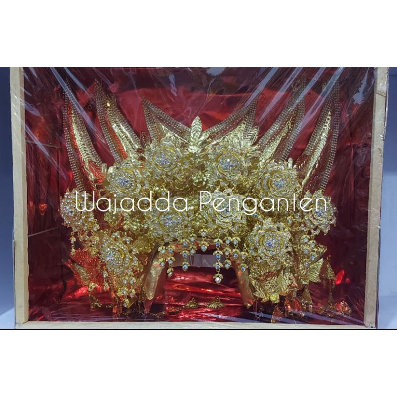 MAHKOTA SUNTING RUNCING RUMAH ADAT MINANG