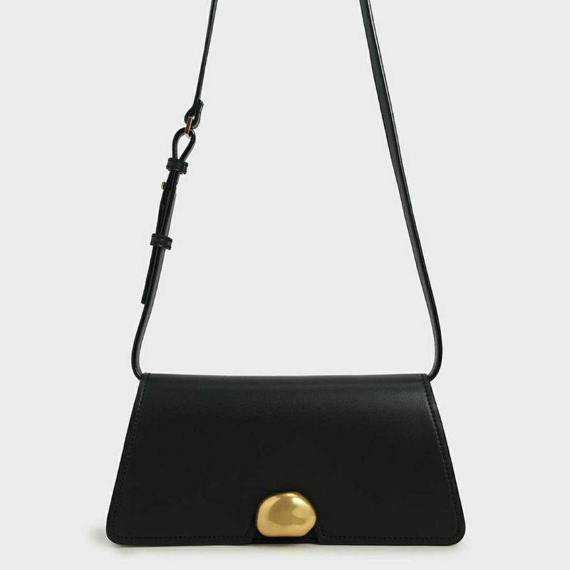 CK metallic accent trapeze shoulder bag