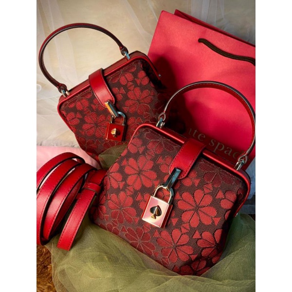 Kate spade Remedy spade flower small top handle red