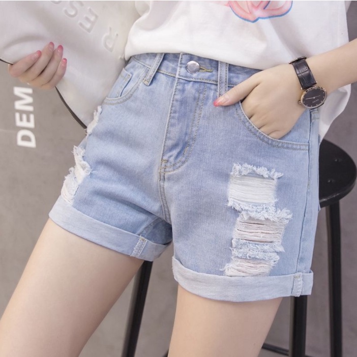 Celana pendek denim robek berpinggang tinggi versi Korea pakaian wanita hot pants kaki lebar longgar Cocok untuk semua usia