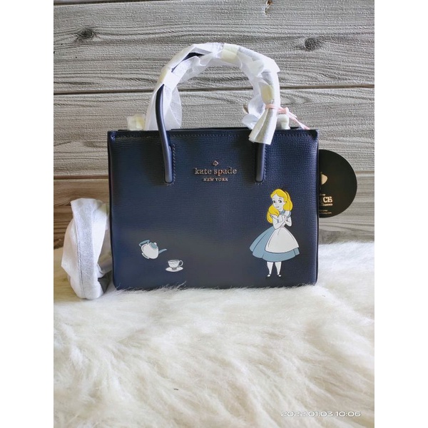 tas Kate spade disney alice satchel navy multi