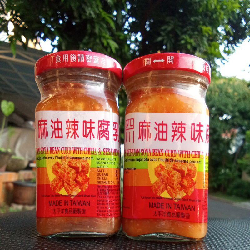 

Fls Sichuan Soya Bean Curd With Chili & Sesame Oil / Tahu Kedelai Dalam Botol Beling 130 Gram