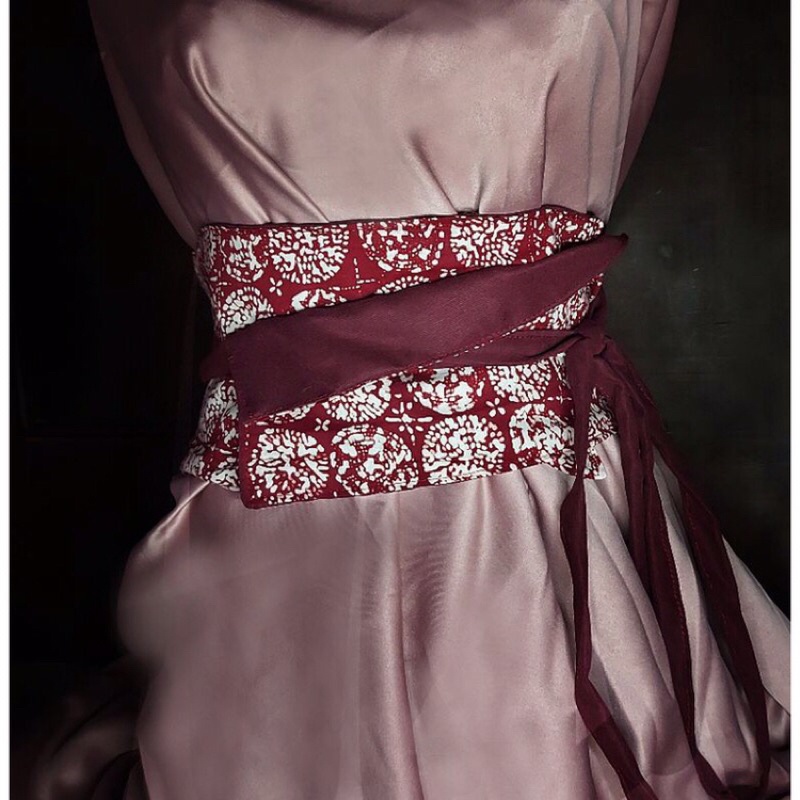 obi merah maroon