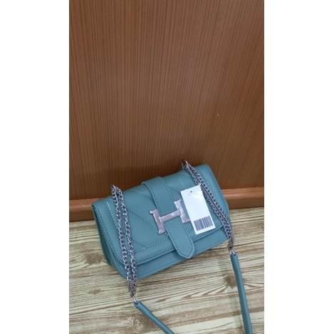 TAS SLEMPANG SNOW TALI RANTE LIDAH H SIZE 21X16CM