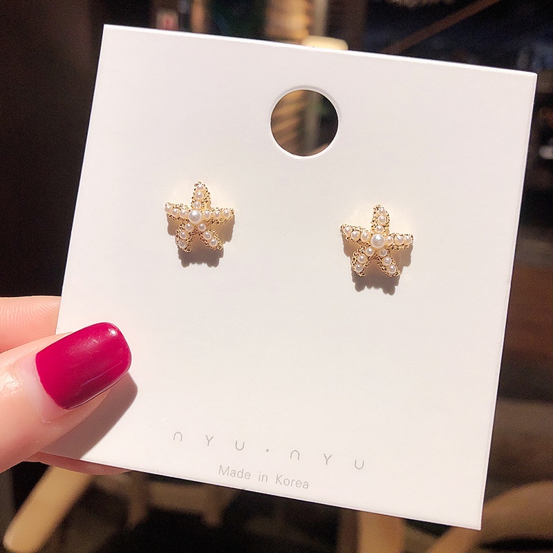 Anting Stud Desain Bintang Laut Aksen Mutiara Bahan S925 Silver Untuk Wanita