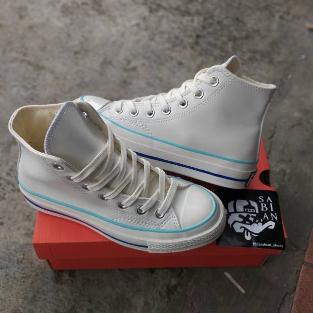 cream leather converse