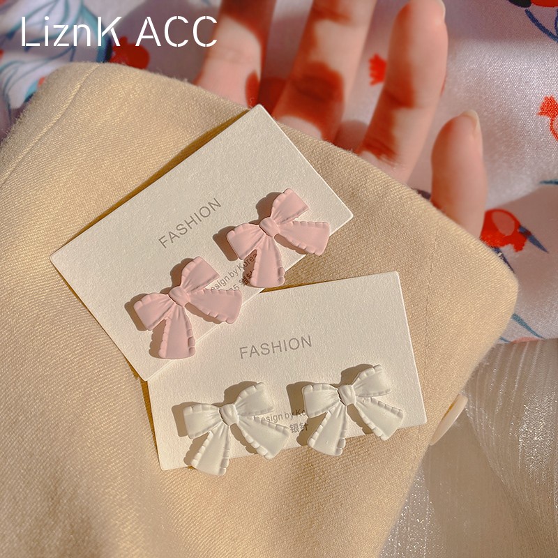 Anting Stud Desain Pita Bahan Plastik Warna Solid Gaya Korea Untuk Wanita