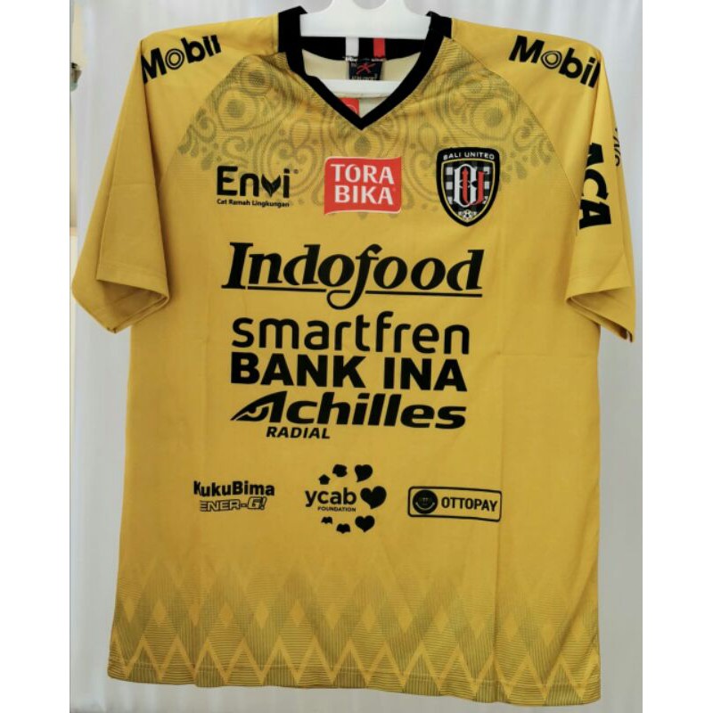 Jersey Bali United warna Gold uk XL