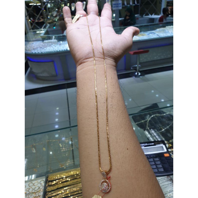 kalung emas panjang model italy santa berliontin mata bundar