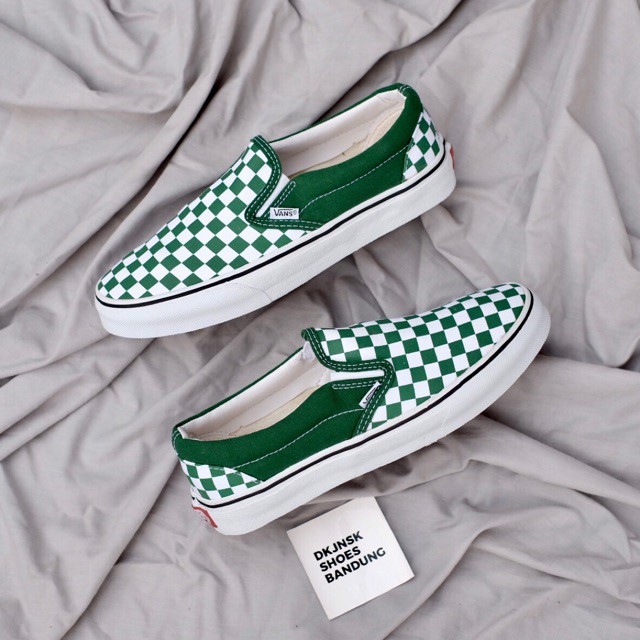 green and white slip on vans