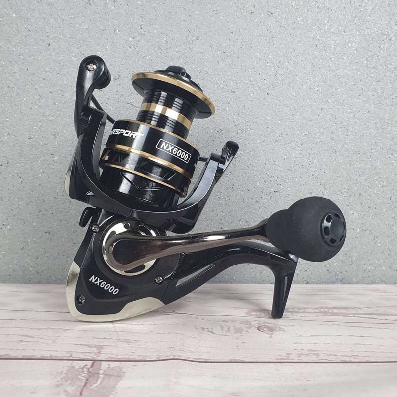 TaffSPORT Gold Sharking NX 2000 NX4000 NX 6000 Series Metal Reel Pancing Fishing Reel 5.2:1 Gear Ratio Drag Power 12Kg - Black