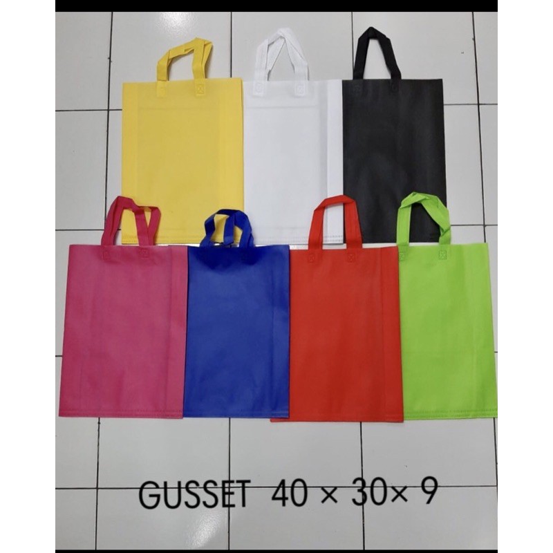 

TAS KAIN/TAS SPUNBOND POLOS HANDLE 30x40/TAS GOODIE BAG POLOS HANDLE