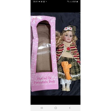 preloved doll porcelain