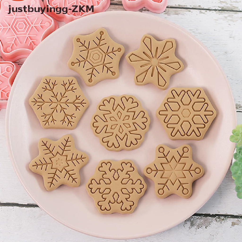 8pcs / set Cetakan Pemotong Kue Kering Bentuk Kepingan Salju Model Timbul Untuk Natal