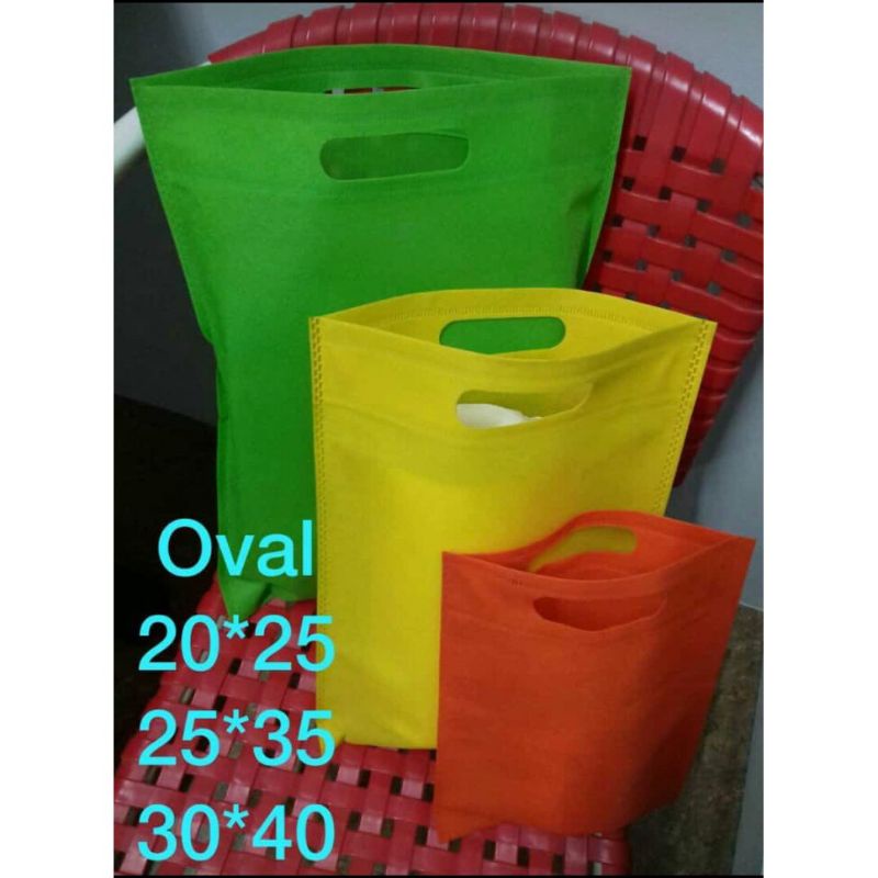 TAS SPUNBOND OVAL CUSTOM SABLON 30X40 TAS PROMOSI TOKO TAHLIL WEDYNG  PROMOSI TOKO HP
